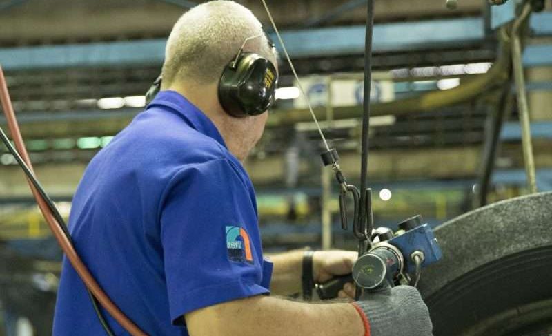 Worker wearing hearing protection